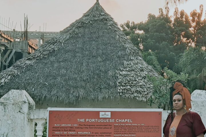 Photo Caption: Kim Poole, Founder of the Teaching Artist Institute, stands at the Portuguese Chapel in Malindi, Kenya, built in 1502 and recognized as the first Christian place of worship in East Africa. The chapel remains a testament to the region’s layered history of colonial expansion