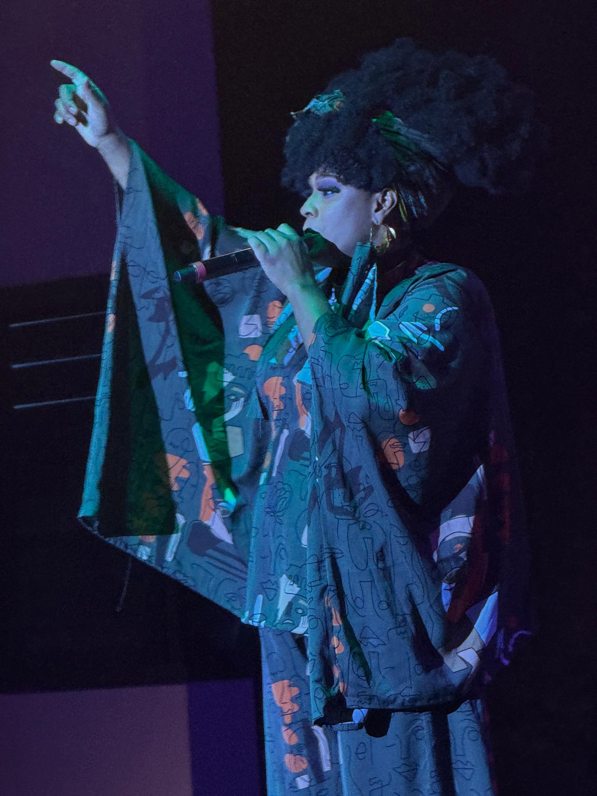 Kim Poole Performing at SheRhythms Photo TenGOL